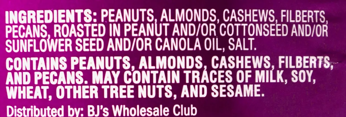 Back label of a Wellsley Farms Roasted Mixed Nuts can naming peanuts first